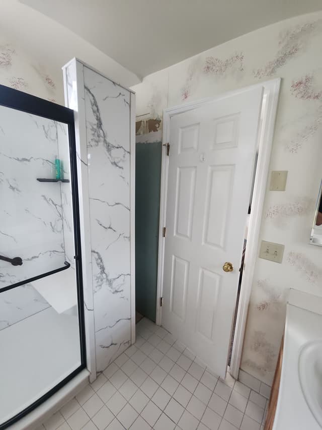Outdated Bathroom Flooring and Walls